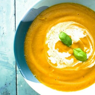 roasted butternut squash soup with a swirl of cream